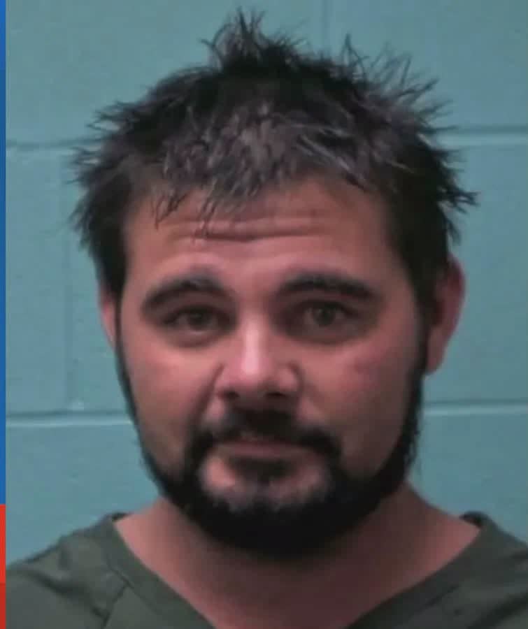 Austin Riggs was arrested 24 hours after leaving a North Carolina jail — allegedly taking his child and sparking an armed standoff