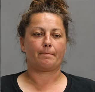 Brazos County deputies arrested Karla Jeannine West for allegedly pelting vehicles — after Good Samaritans stopped to help her stalled car