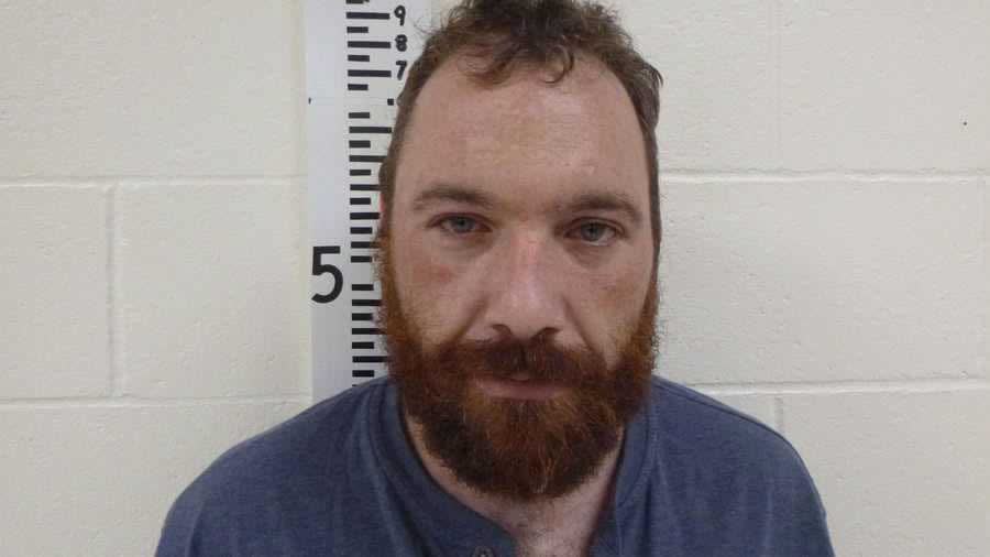 Limington suspect John Bechard, 32, accused of assaulting wife and pointing gun before fleeing troopers, is captured in Hiram